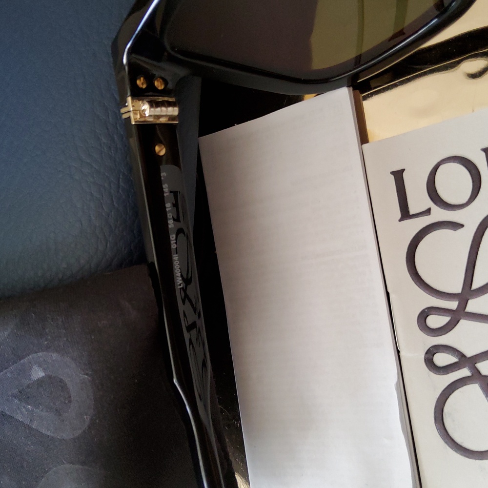 Loewe Unisex Black Sunglasses with Vibrant Red/Mirrored Lenses. - Picture 6 of 7